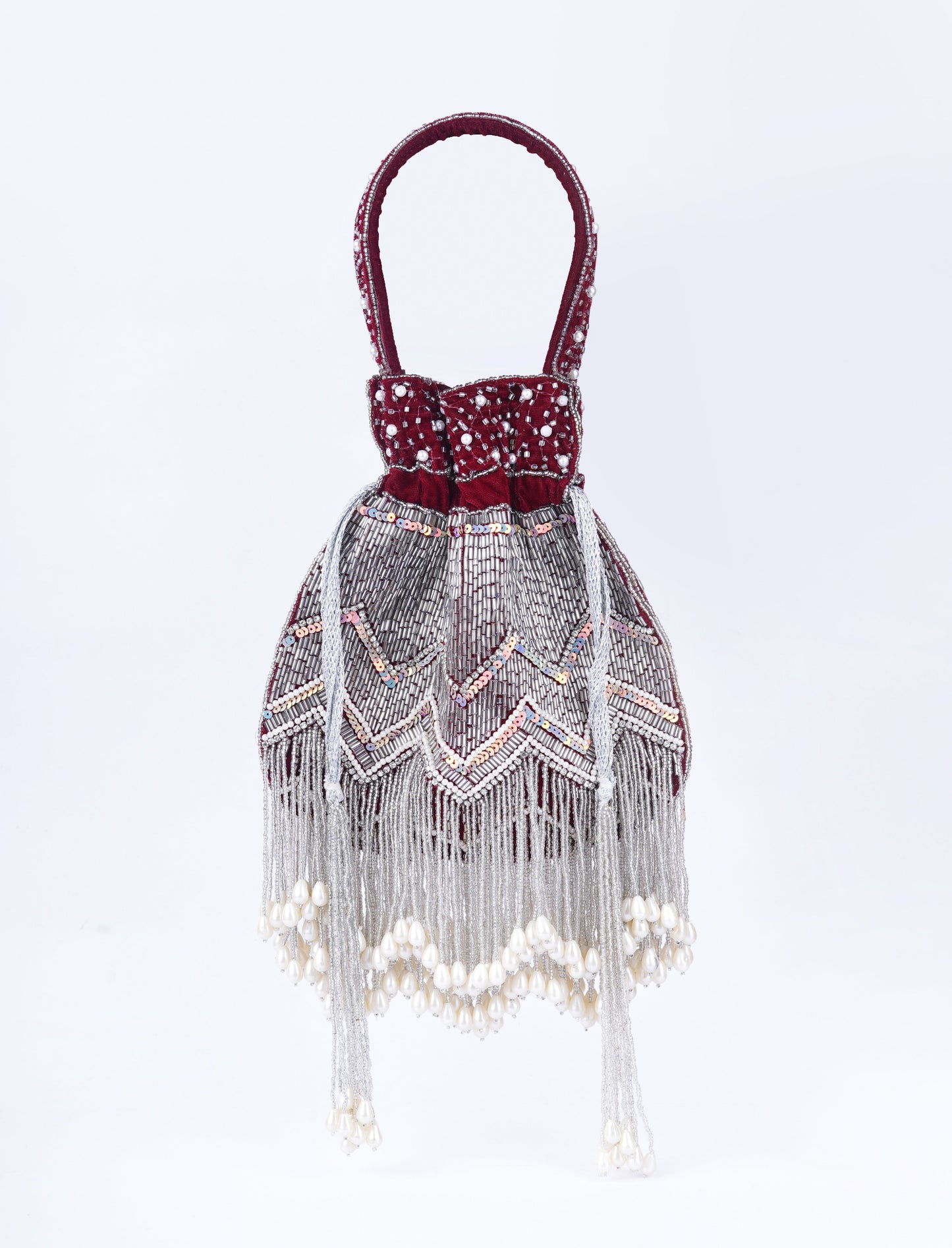 Luxury evening potli with pearl detailing and hand embellishment, a stunning accessory for celebrations and parties