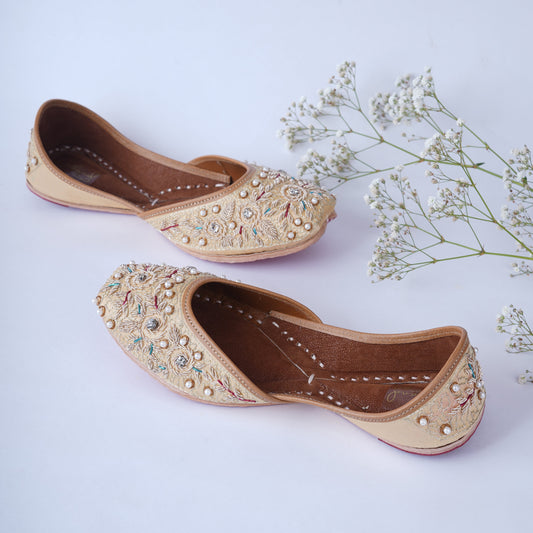 Designer golden jutti with detailed handcrafted work