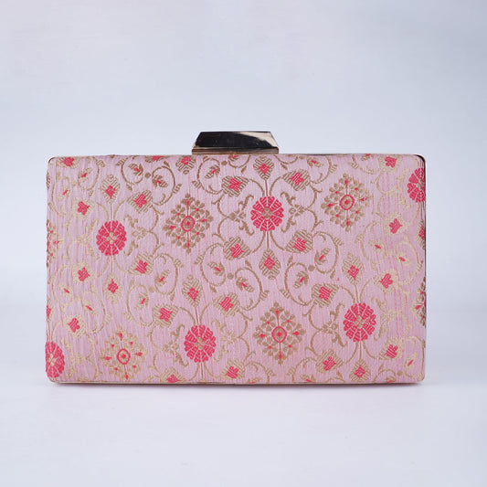 Elegant clutch made with authentic Banarasi silk fabric, featuring traditional patterns and a rich, festive vibe – perfect for weddings and ethnic outfits