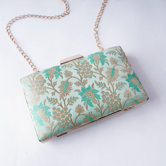 Classic Banarasi weave clutch with rich textures and intricate detailing, handcrafted for weddings, festivals, and cultural occasions

