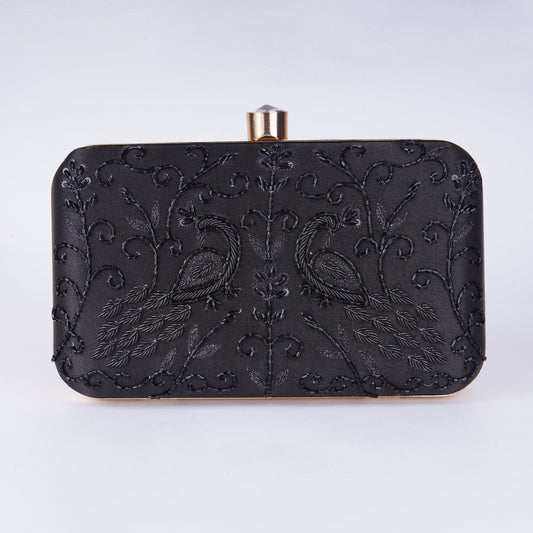 All black handcrafted rectangle clutch with intricate embellishments, perfect for evening parties and festive wear