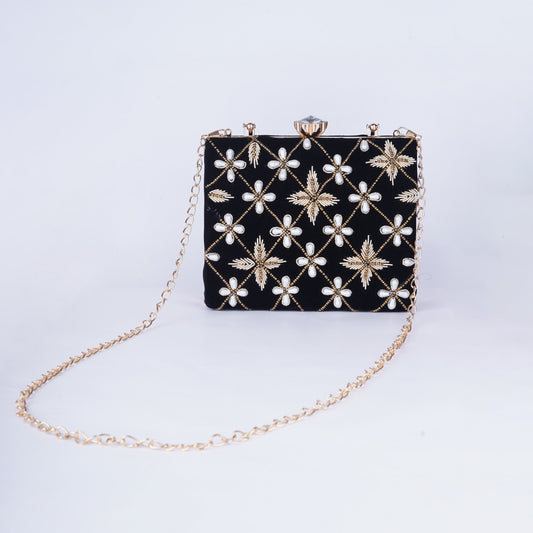 Chic black box clutch with detailed embroidery and a structured silhouette, ideal for ethnic and fusion wear