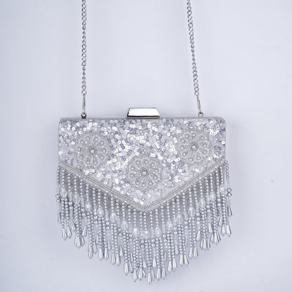 Sequin-embellished rectangle clutch featuring handcrafted detailing, drop tassels, and a detachable chain – comes in black, gold, antique, and silver