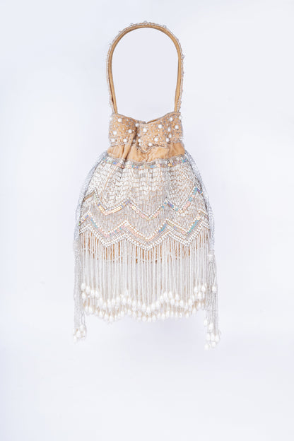 Statement pearl potli bag with fine embellishments, handcrafted to complement festive, bridal, and ethnic ensembles

