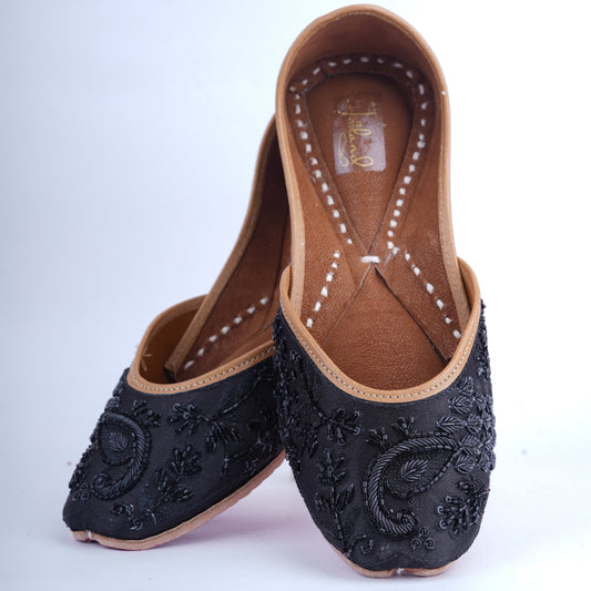 Black party wear jutti with embellishments – perfect for festive and formal looks