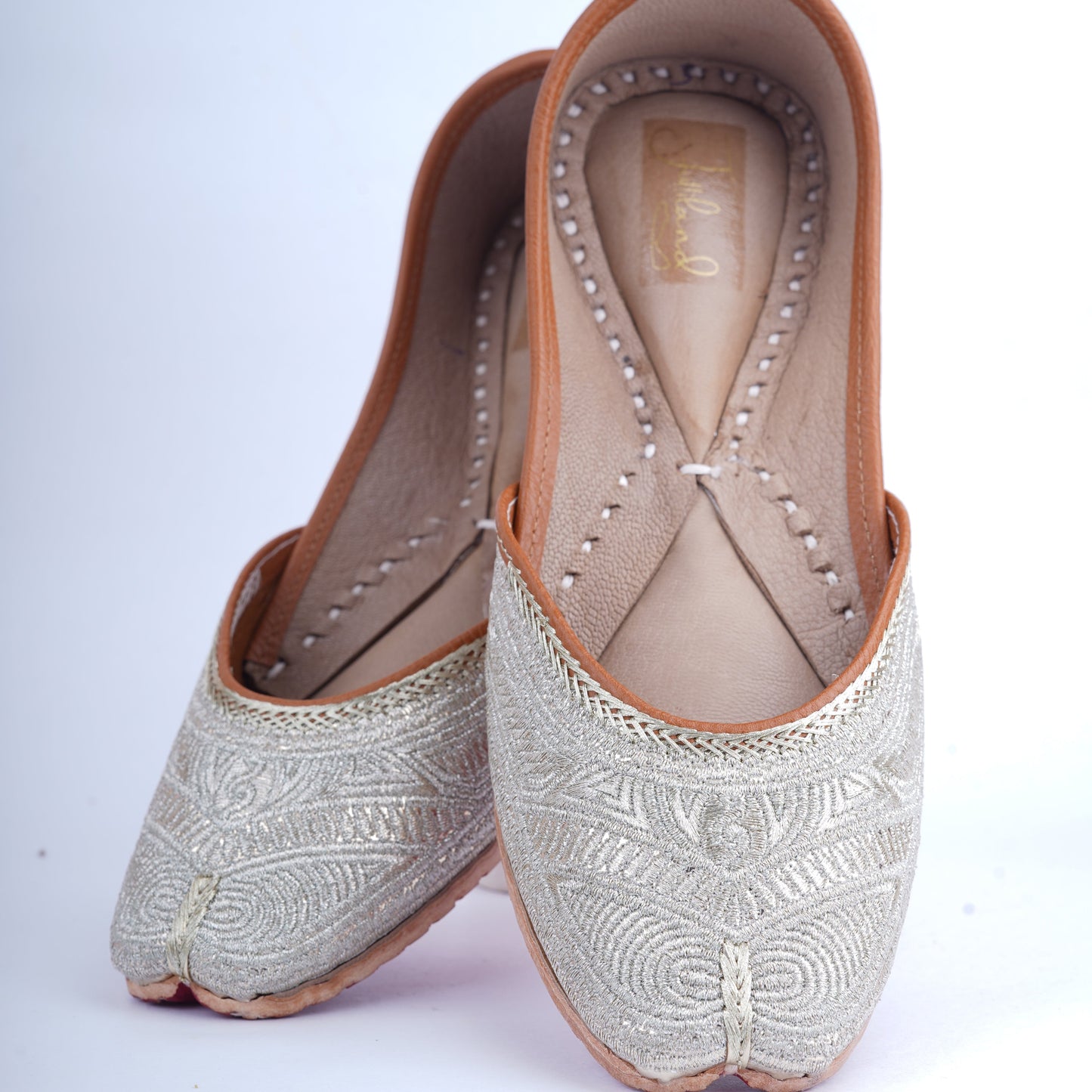 Handcrafted golden jutti with fine zari work – ethnic and stylish