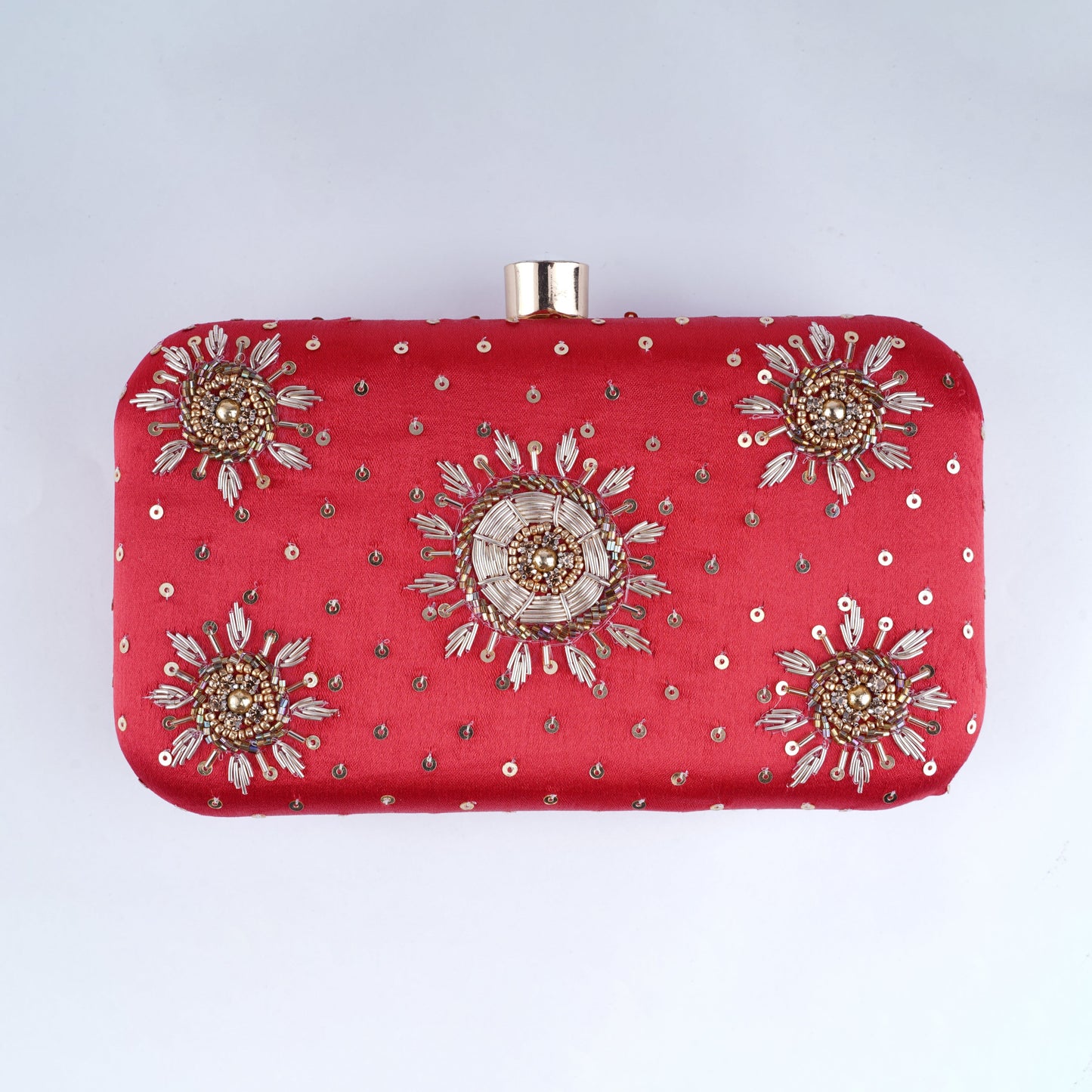 Red bridal clutch bag – elegant handcrafted accessory for Indian brides to carry essentials in style on the wedding day