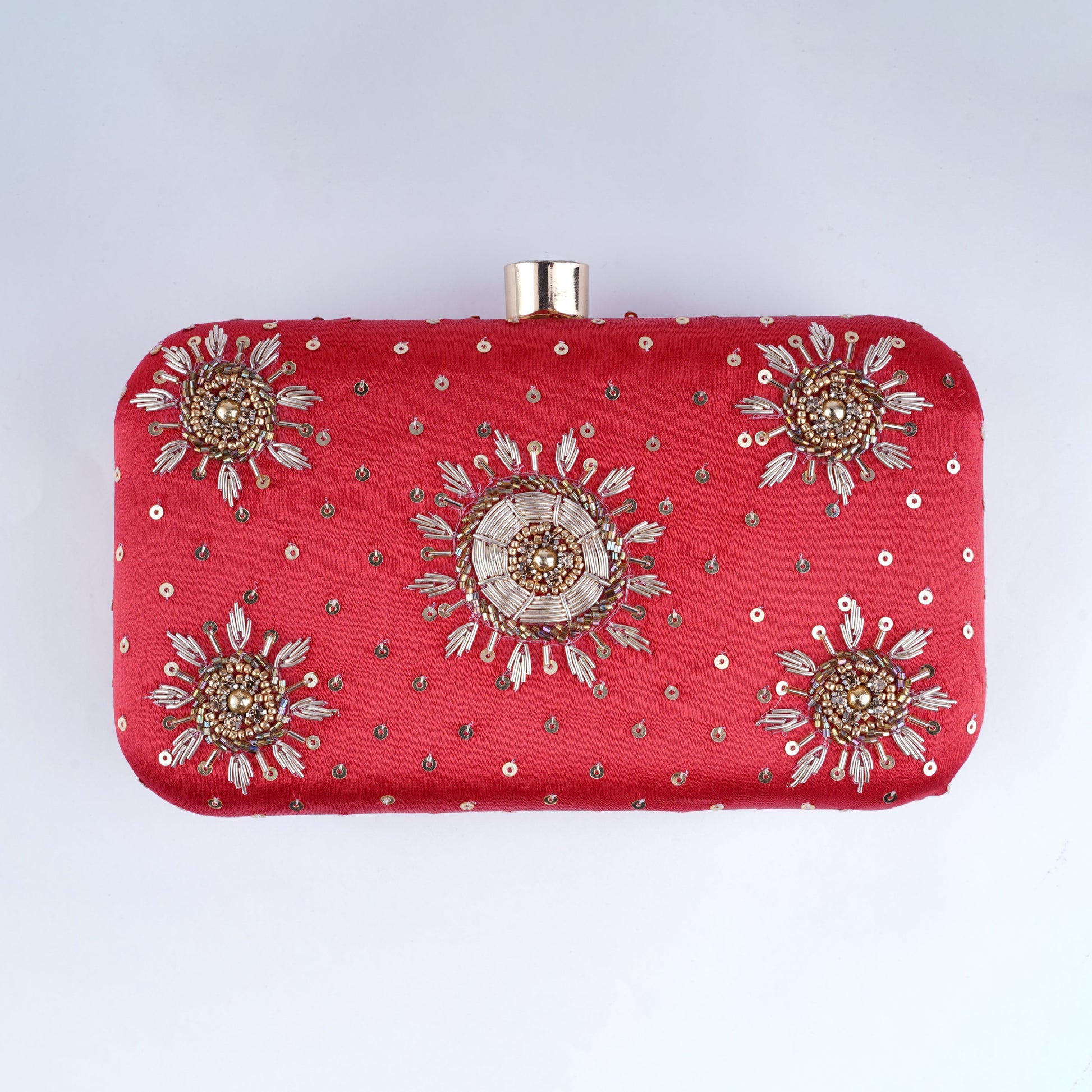 Red bridal clutch bag – elegant handcrafted accessory for Indian brides to carry essentials in style on the wedding day