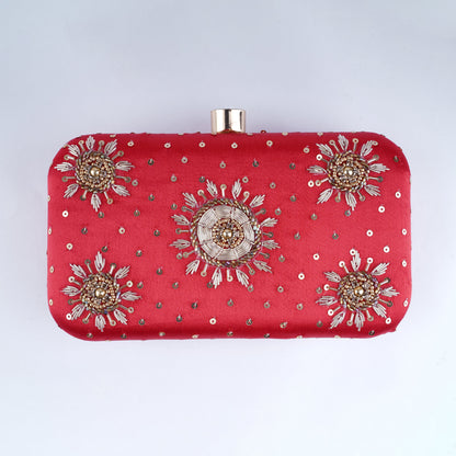 Red bridal clutch bag – elegant handcrafted accessory for Indian brides to carry essentials in style on the wedding day