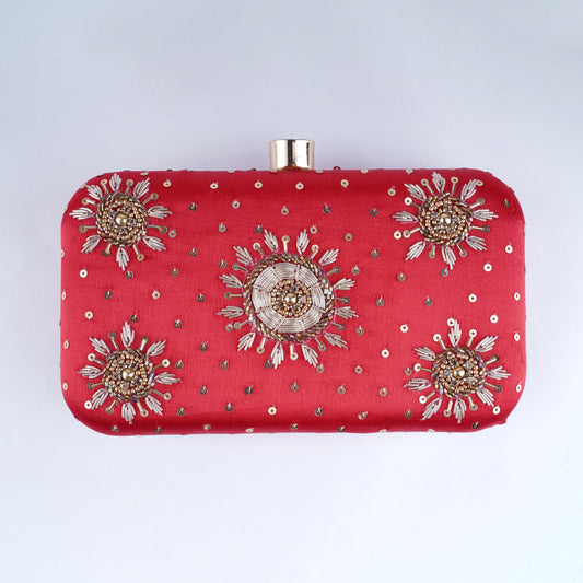 Red bridal clutch bag – elegant handcrafted accessory for Indian brides to carry essentials in style on the wedding day