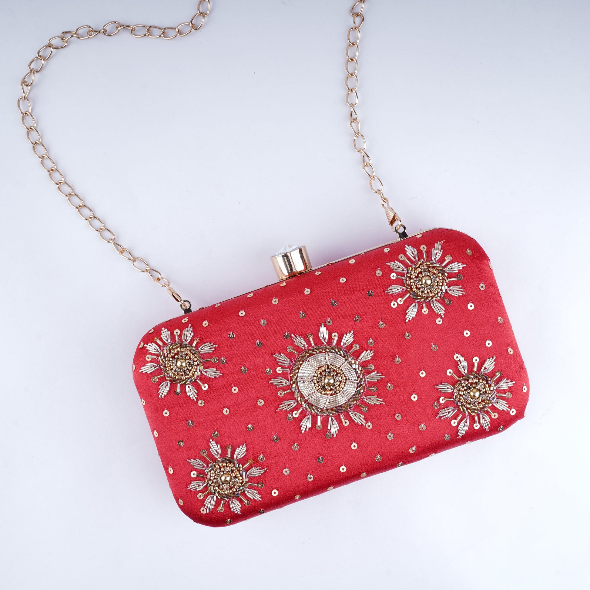 Wedding red clutch bag – ethnic bridal accessory with rich embroidery and festive detailing